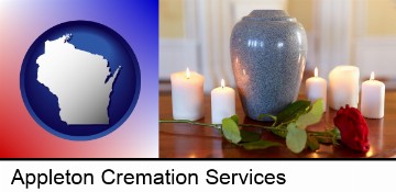 cremation urn with red rose and burning candles in Appleton, WI