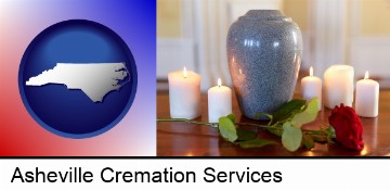 cremation urn with red rose and burning candles in Asheville, NC