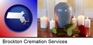 cremation urn with red rose and burning candles in Brockton, MA