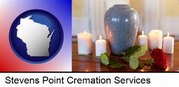 cremation urn with red rose and burning candles in Stevens Point, WI